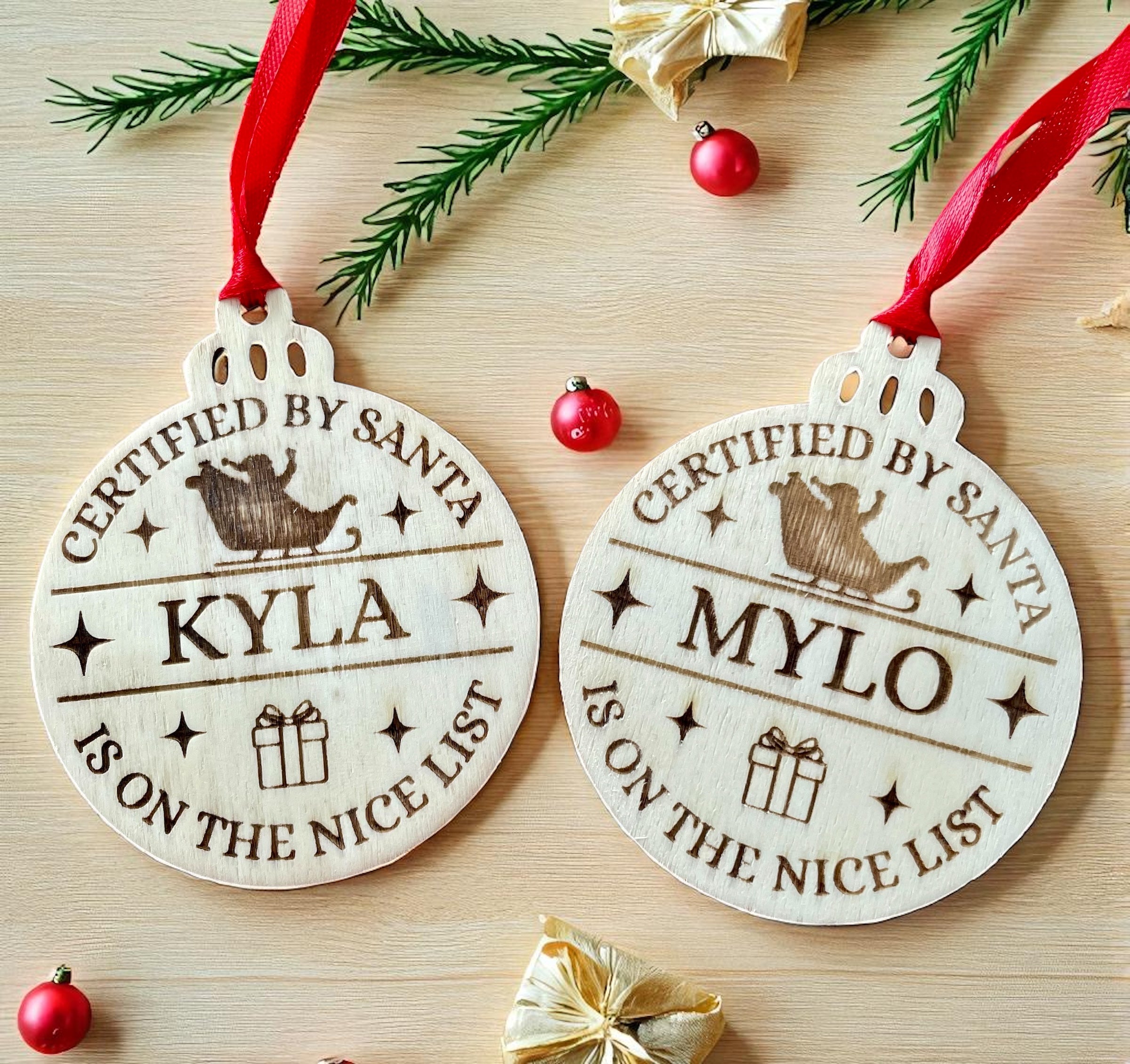Personalised Santa's Nice List Bauble: Engraved Wood Christmas decoration