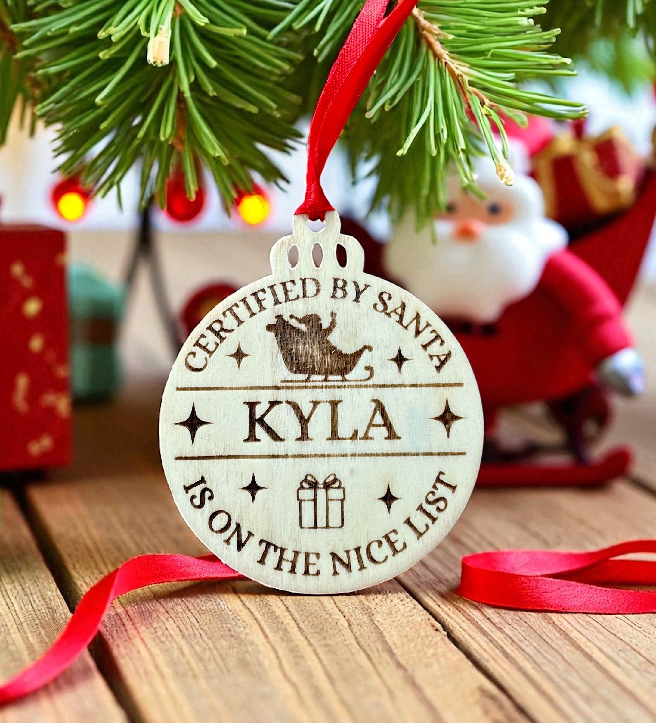 Personalised Santa's Nice List Bauble: Engraved Wood Christmas decoration