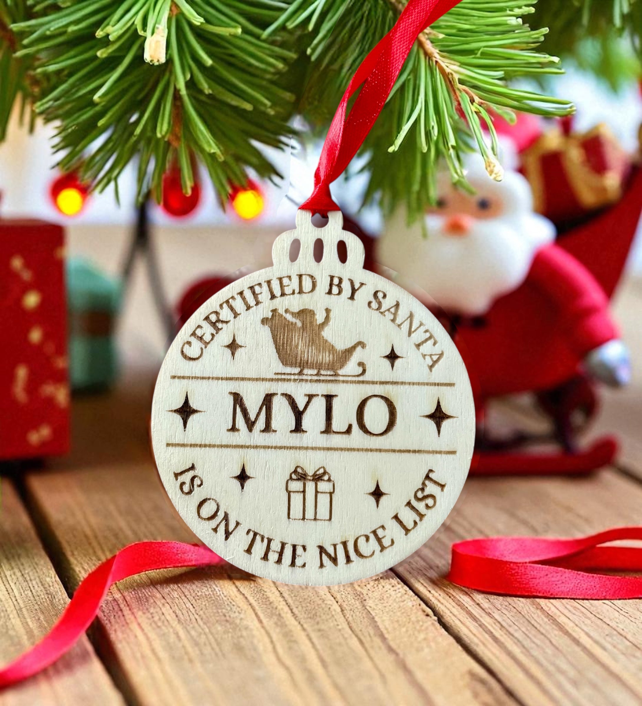 Personalised Santa's Nice List Bauble: Engraved Wood Christmas decoration