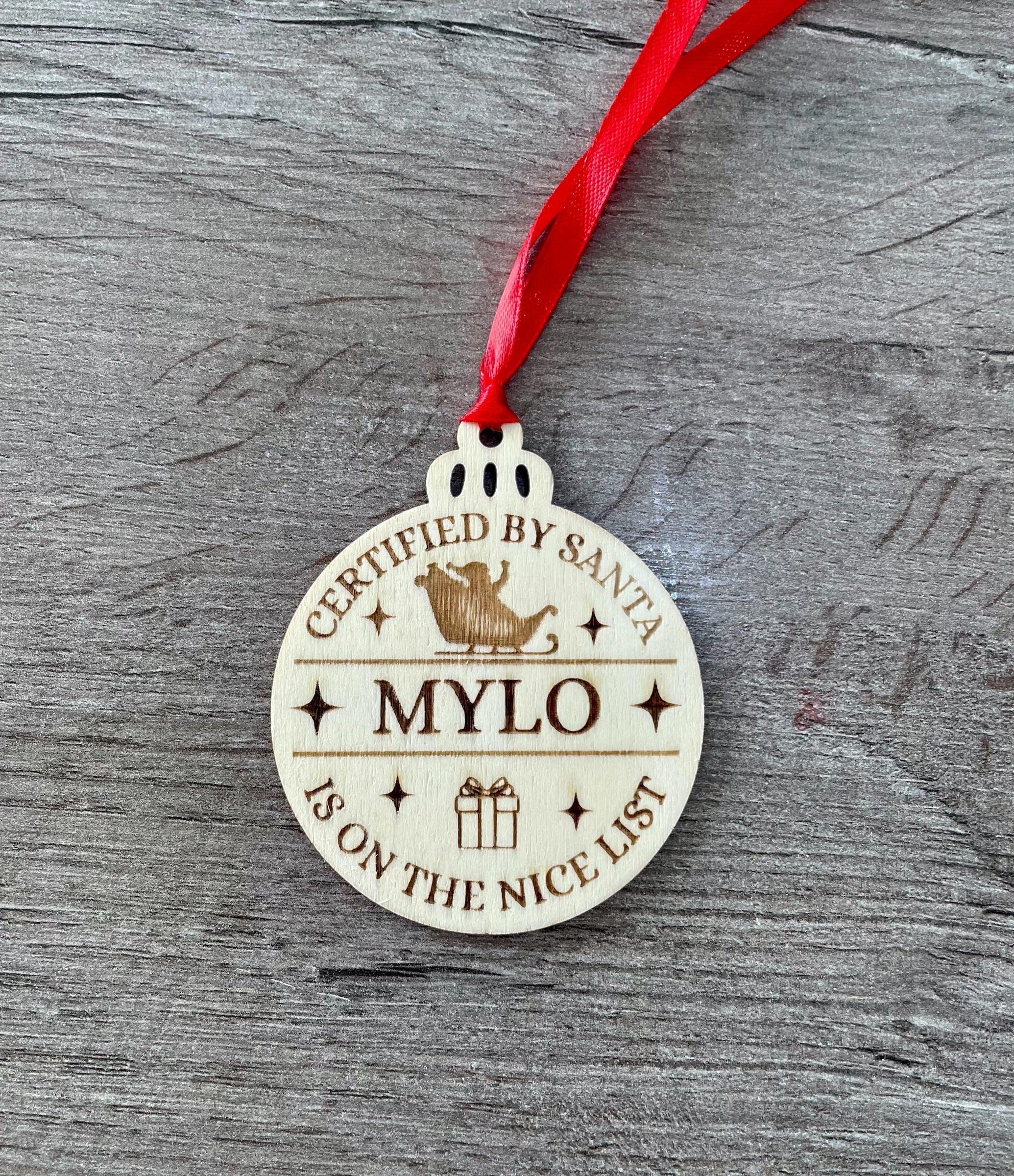 Personalised Santa's Nice List Bauble: Engraved Wood Christmas decoration